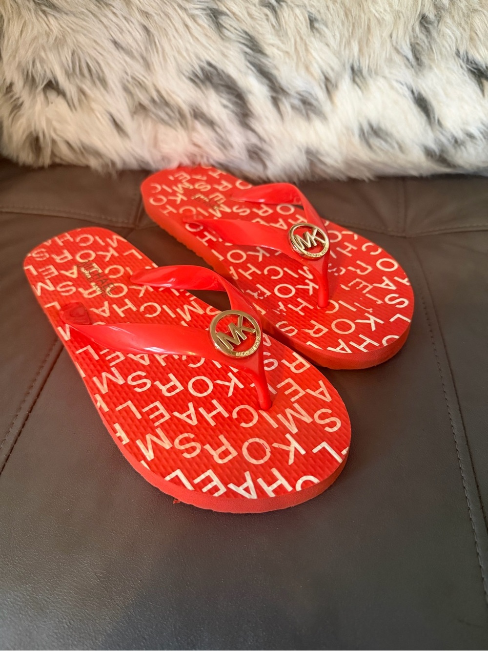 Michael Kors Mandarin Orange Logo Flip Flops with Gold MK Emblem